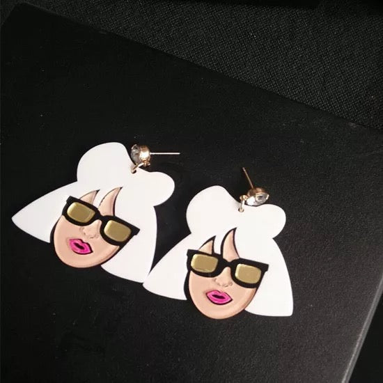 Lady Gaga and her legs acrylic earrings -- Bad Romance!!